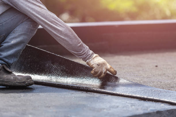 Professional Basement Waterproofing technician working in Butler, IN